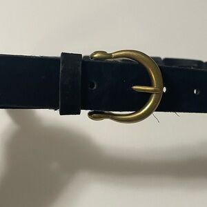 Black suede belt with brass buckle. size L. Suede rectangles sewn together.